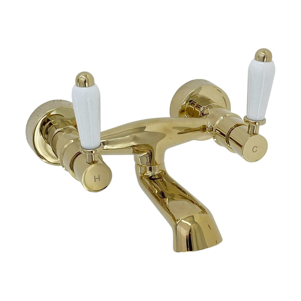Downton wall mounted bath mixer tap with white ceramic levers - gold