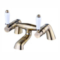 Downton bath mixer tap with white ceramic levers - antique brass
