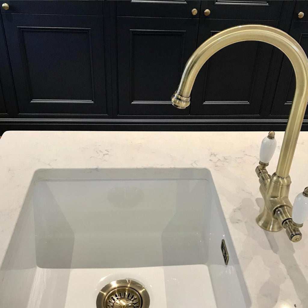 Dorchester Georgian dual flow kitchen sink tap with twin white levers - antique brass