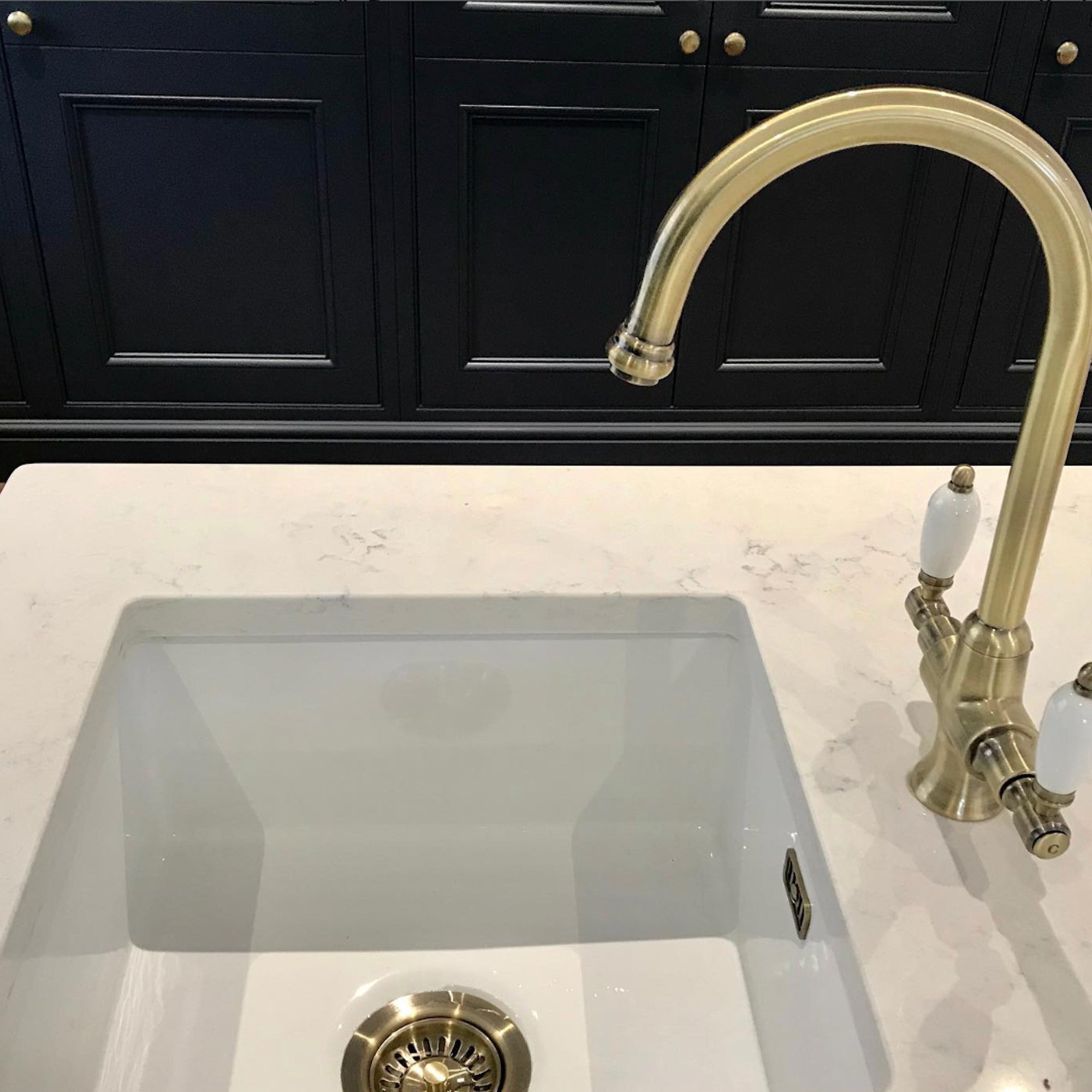 Dorchester Georgian dual flow kitchen sink tap with twin white levers - antique brass
