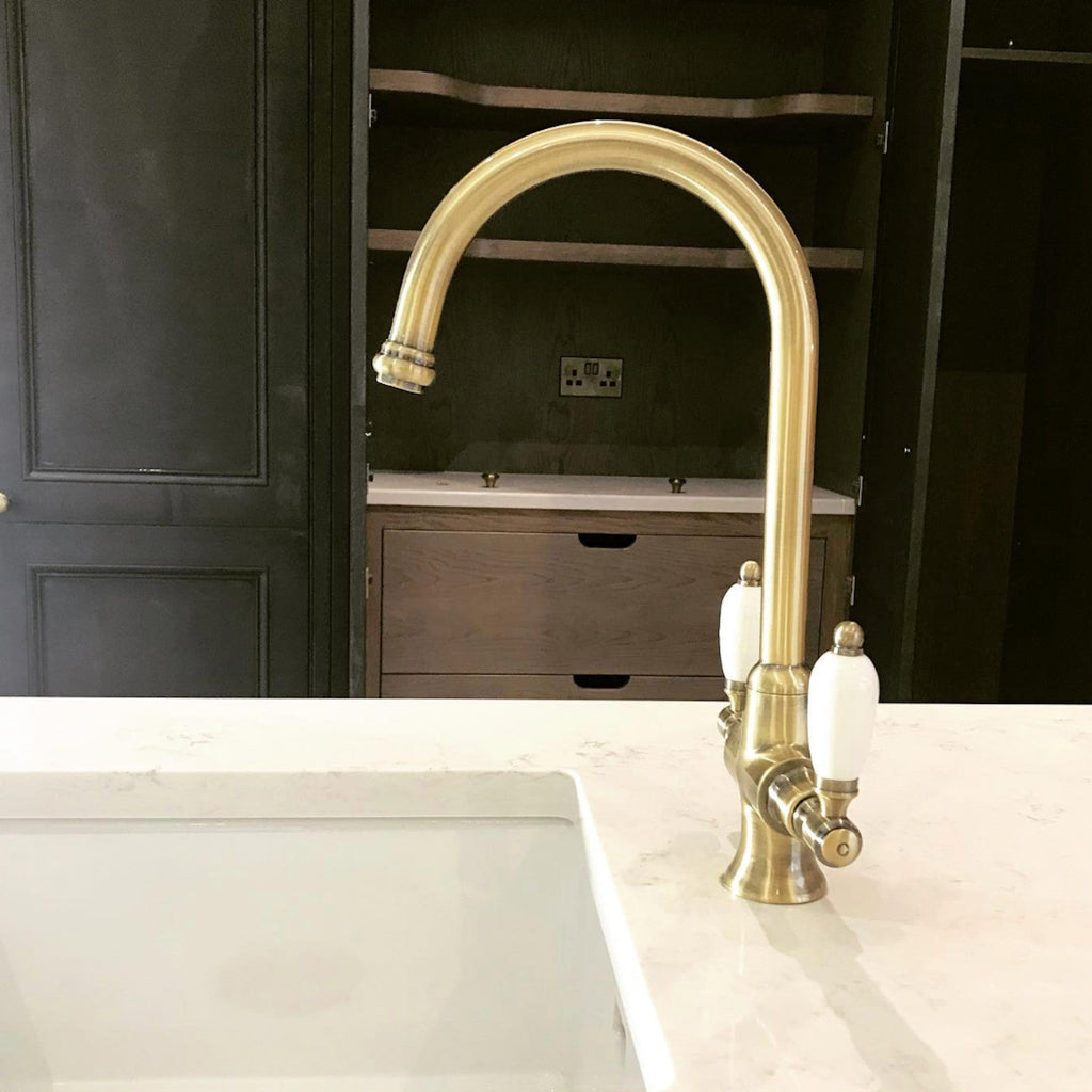 Dorchester Georgian dual flow kitchen sink tap with twin white levers - antique brass