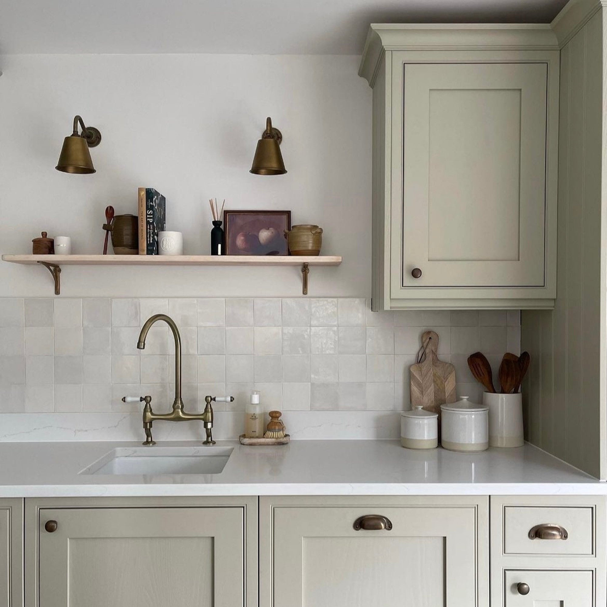 Astbury traditional bridge kitchen mixer tap with white ceramic levers deck mounted - antique brass