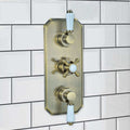 Regent traditional crosshead and white lever concealed thermostatic triple shower valve with 2 outlets - antique brass
