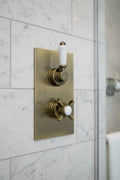Edwardian traditional crosshead and white detail concealed thermostatic twin shower valve with 2 outlets - antique brass